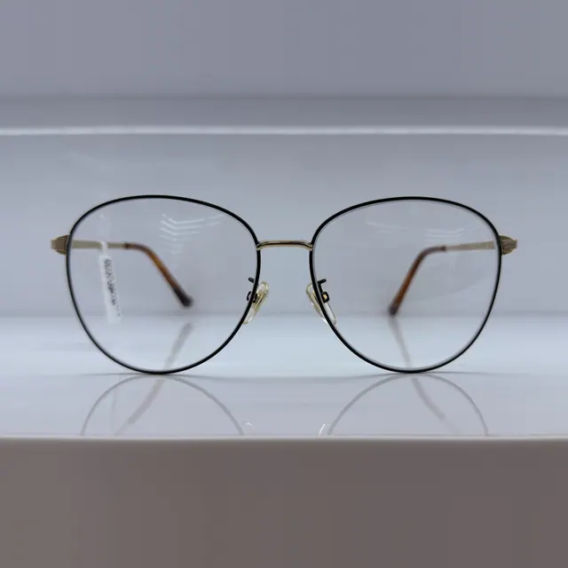 Dolce & Gabbana Round Metal Eyeglasses, Black And Gold, Women Eyeglasses by Dolce & Gabbana