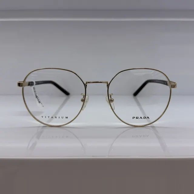 Prada Round Titanium Eyeglasses, Gold, Unisex Eyeglasses by Prada